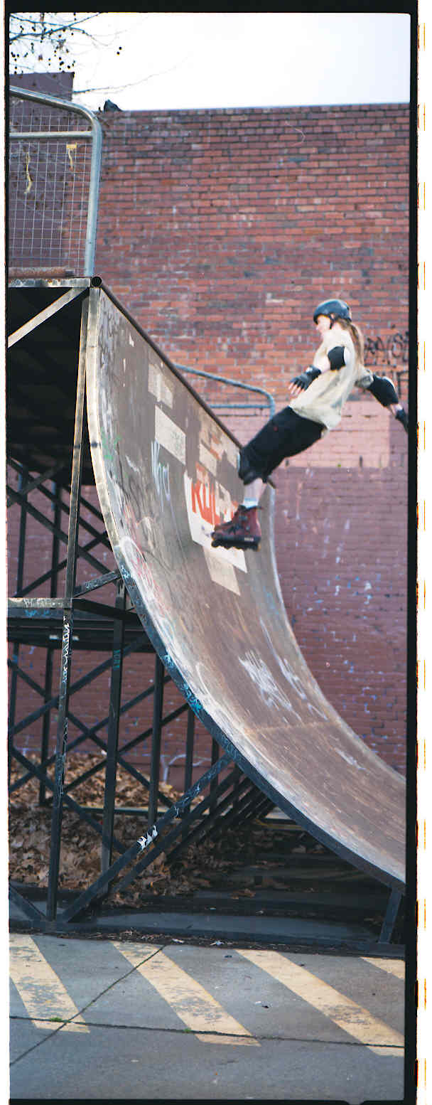 [skating the half-pipe at Princes Gardens]